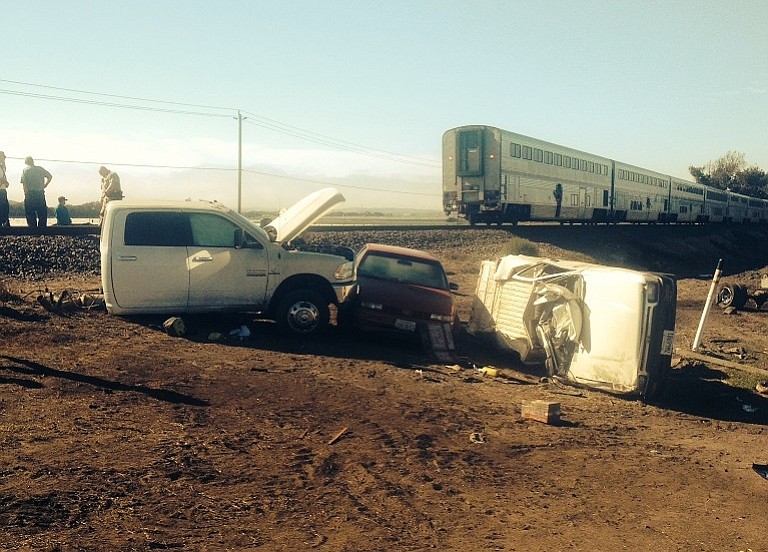Train Hits Car on Tracks