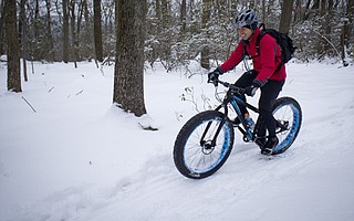 Jericho Estella plows through winter snow in Frederick Maryland.