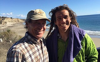 Rob Rebstock, pictured here with his son, Patrick, died while surfing at Hollister Ranch on January 29.