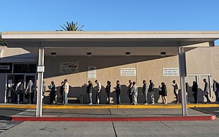 Undocumented immigrants line up outside the Santa Barbara DMV the first day AB 60 went into effect