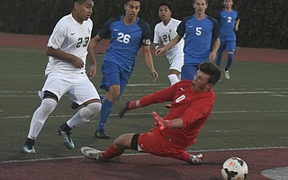 Santa Barbara High’s Juan Carlos Torres (23), known as “J.C.,” led the Dons to a 3-0 victory over the San Marcos Royals.