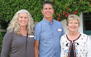 Board Chair and volunteer Kelly Onnen, Vice Chair and volunteer Dave Gonzales, and Treasurer and volunteer Kathy Denlinger