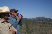 Ray Ford and Otis Calef overlook Rincon Mountain and the flatlands of Carpinteria at an overlook on the lower Franklin Trail.