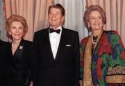President Ronald Reagan and First Lady Nancy Reagan stand with Katharine Graham (at right, not to be confused with another publisher named Wendy McCaw).
