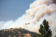 2:59PM. Tankers appear dwarfed by the firestorm but valiantly drop load after load of the fire retardant.