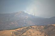 Fire burns across the front flank of San Rafael Mountain and is on the edge of moving down into Peachtree Canyon.