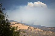 About 1PM as the flames build heat a huge thunderhead builds over the West fork of Santa Cruz drainage.