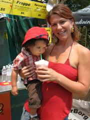 Nicole Schultz gives 17-month-old Nicholas Schultz-Clifford a taste of her strawberry smoothy at the Gay Cafe