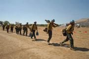 The Lassen Hot Shot team returns to the helipad at Rancho San Fernando Rey on Tuesday afternoon.