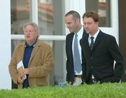 L to R Marty Keegan, Barney McManigal, and Tom Schultz leave the U.S. Bankruptcy Court at Lunch time Wednesday.