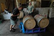 Jaffurs General Manager Dave Yates pushes freshly barreled grenache deep into the climate-controlled recesses of the Jaffurs Montecito Street facility.