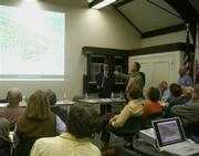 Concerned Montecitans watched as Rick Caruso and his planner presented plans for the new Miramar.