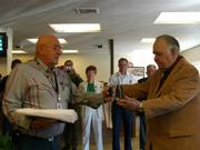 Herb McElwee (left) presents comedian Jonathan Winters with an award from the Wildland Firefighters Foundation for the actor's entertaining help during the Zaca Fire.