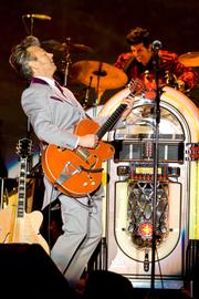 Former Stray Cat Brian Setzer led his orchestra through a night of classic hits and rollicking Christmas tunes last Friday at the Chumash Casino.