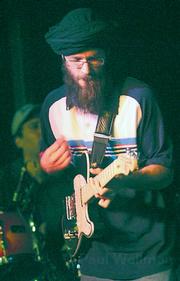 Groundation's Harrison Stafford does his best Bob Marley at Sunday's musical tribute to the late, great reggae star.