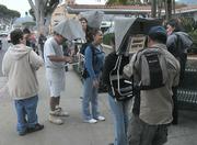 As part of the REGRETS project, students recently walked Milpas Street wearing backpacks with built-in computers and invited members of the public to enter their regrets into the project's database.