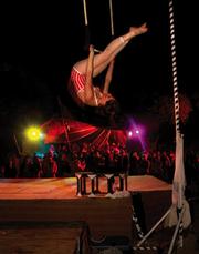 An aerialist wows the crowd at last year's Lightning in a Bottle festival.
