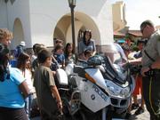 Ellwood School students check out a police motorcycle at the new Goleta police station.