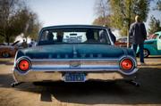 A Ford Galaxie, driven by members of Infernos Car Club from Buellton, California, pulls into the Famoso Raceway.