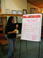 Laguna's Kenya Rodriguez teaches a group of young girls about why they should pursue higher education.