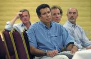 Environmental review consultants Luis Perez (foreground) and Greg Chittick of Marine Resource Specialists take in public comment.