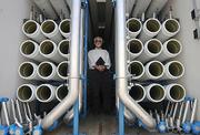 City Water Planner Bill Ferguson in a trailer that holds membrane filters at Santa Barbara's dormant water desalination plant.