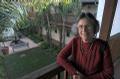 Former mayor Sheila Lodge prefers shorter buildings, smaller rooms, and interior gardens such as those at Casa de Los Fuentes, affordable housing for downtown workers.