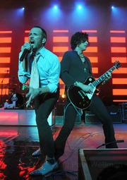 STP frontman Scott Weiland (left) belts through the hits with guitarist Dean DeLeo during last Saturday's tour-closing show.