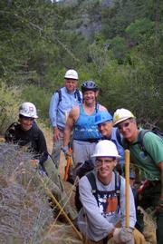 Volunteers helping brush out the Davy Brown Trail in the backcountry as part of National Trails Day.