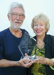 Gerrald Locklin (left) presented with the Glenna Luschei Distinguished Poet Fellowship Award at Santa Barbara's Book & Author Festival. Glenna Luschei is pictured right.