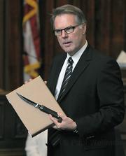 During his closing arguments, Hilary Dozer shows the jury "The Big One", the knife used in the killing of 15-year-old Luis Angel Linares