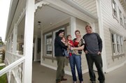 From left: Russell and Page (with daughters Layla and Aubrey) and Page's brother Ethan stand in front of the new tasting room for Qupe Wine Cellars.