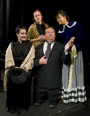 Leslie Story, Stephanie Sivers, and Deborah Helm surround Ed Giron as the town judge in Edgar Lee Masters's <em>Spoon River Anthology</em>.