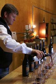 Brook Williams pours out a vertical selection of Zaca Mesa wines, going back to the early 1990s.