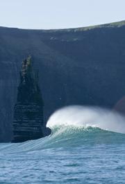 A wave breaks at 'Aileens' near the Cliffs of Moher, Co. Clare, Ireland.