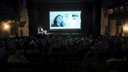 After screening his movie Road to Fallujah at the Arlington Theatre on Thursday, Mark Manning connected a live satellite video feed with Iraqi civilians.