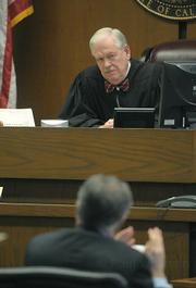 Judge J. William McLafferty listens to arguments from Fred Woocher, legal council for Doreen Farr