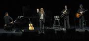 L to R Philip Glass, Patti Smith and Smith's longtime musicians Jay Daugherty, and Lenny Kaye