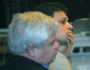 Luis Sosa shows little emotion as the jury foreperson reads the guilty verdict in the murder of Frank Tacadena