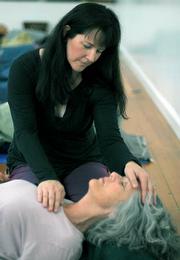 Instructor Cheri Clampett offers "healing" yoga classes that focus on meditation and stretching positions rather than athletic moves.