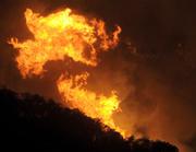 Flames from the Jesusita Fire reaching up the backside of Gibraltar Road on Wednesday night