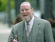 Stephen Hogg, Hollywood's family friend and attorney, took the stand Tuesday to say he encouraged Hollywood to go to police.