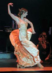 Lead dancer Celina Zambon delights audience members during Saturday's <em>Flamenco Loves Tango</em> performance at the Lobero.