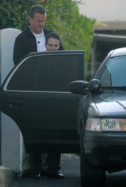 Jesse James Hollywood leaves the Santa Barbara Superior Courthouse in custody July 1, 2009 as the jury begins its deliberation on kidnapping and murder charges.