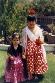 The author's family has been involved in Fiesta for generations. Her daughters Laura and Debbie (far left) were decked out in 1971.