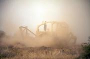 Dozer operators are not always appreciated in the back country until a fire break needs clearing as the flames approach.