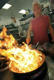 <strong>Uncle Chen Restaurant:</strong> The Carpinteria restaurant's owner and head chef Tsai-Wang Lee fires up something delicious for his customers.