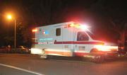 Lights and siren clear the path as an ambulance leaves Isla Vista during halloween 2008