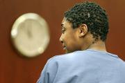 Ashley Johnigan speaks to Stephen Cleaves before being sentenced for her role in the DUI crash that killed Laura Cleaves. 11/19/09