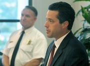 Acting District Attorney Joshua E. Lynn opens the Jesusita Fire press conference with County Fire Chief Michael Dyer.